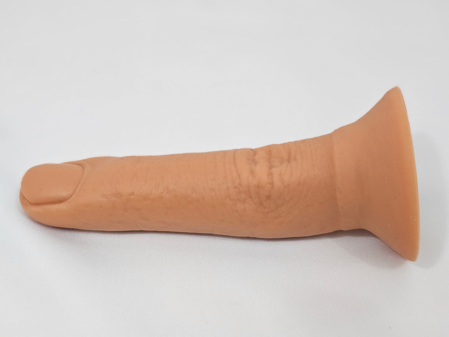 Index finger dildo.