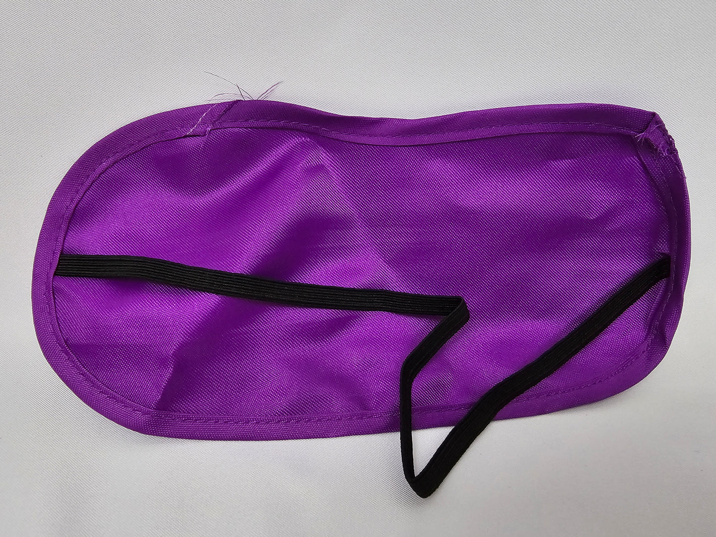 Purple blindfold.